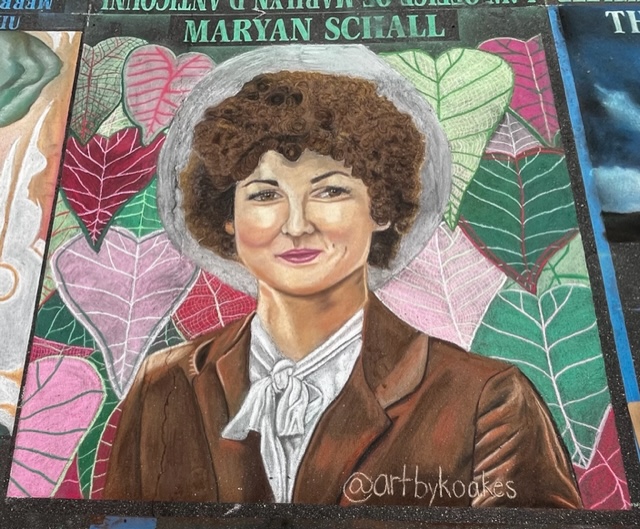 chalk art drawing of woman with caladiums