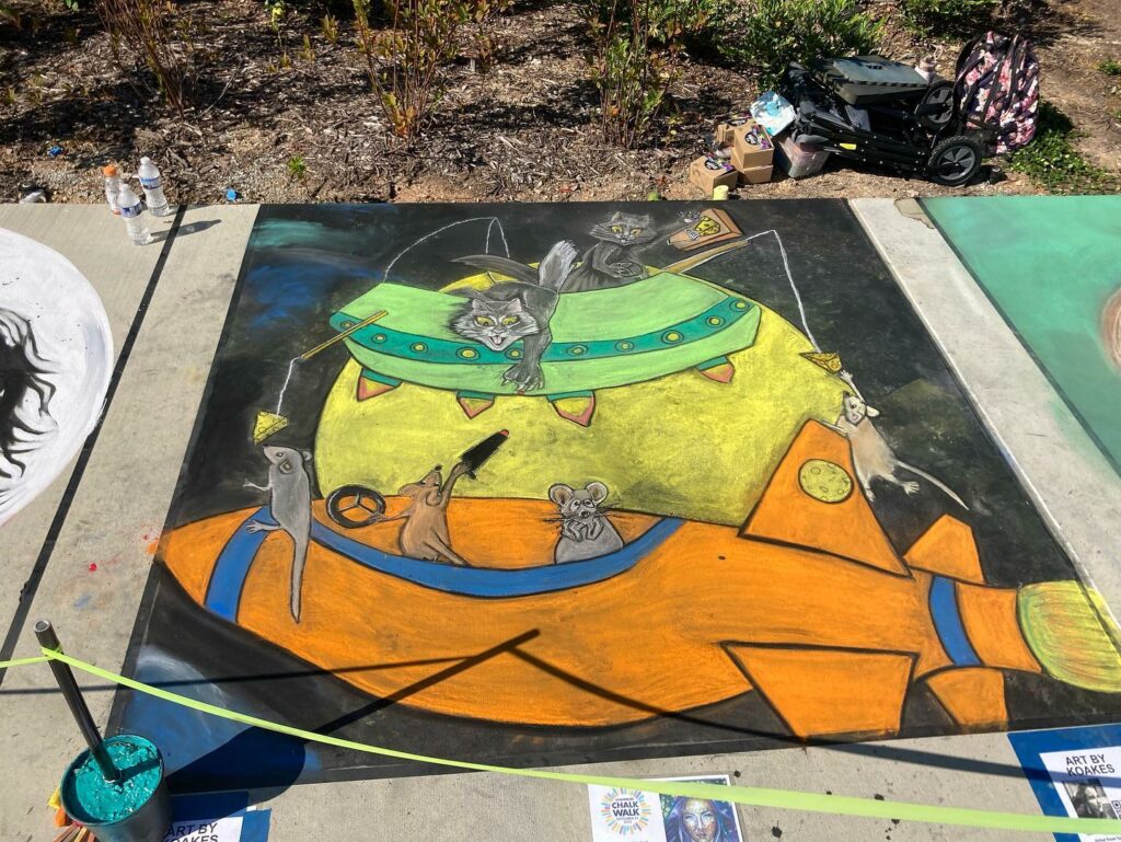 chalk art drawing of cats fighting mice in space