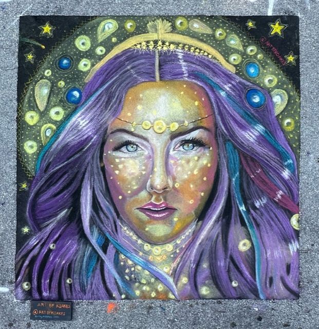 chalk art drawing of a woman with stars